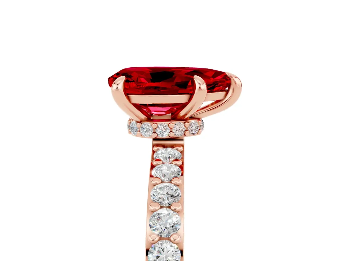Pear Cut Ruby Solitaire Engagement Ring with Pavé Band and Four-Prong Setting Rose gold