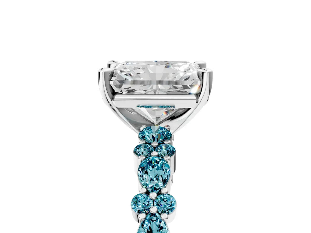 Radiant Cut Diamond Side Stone Solitaire Ring with Round Blue Topaz and Four-Prong Setting Silver