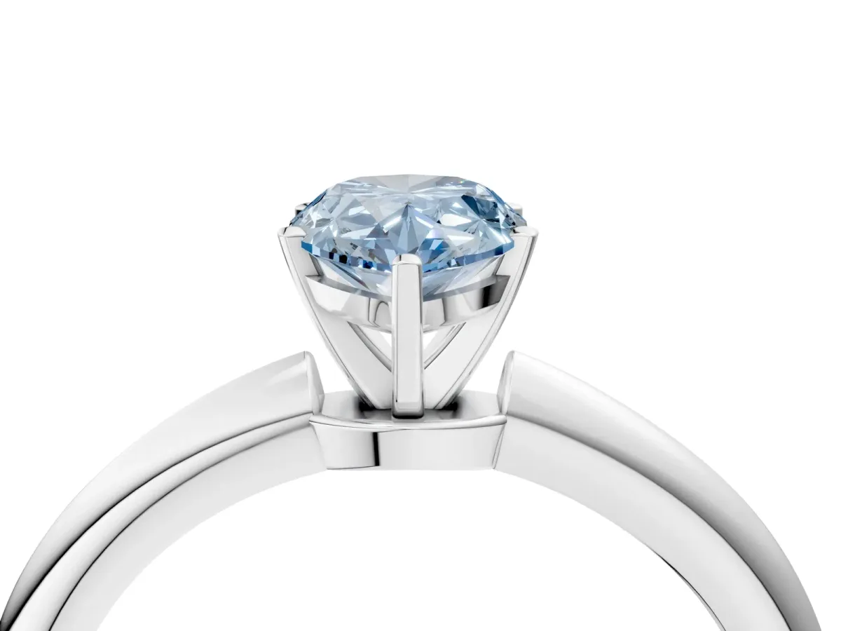 Fancy Blue Pear Cut Diamond Solitaire Ring with Six-Prong Setting and Classic Band Platinum