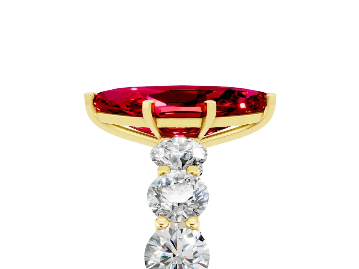 Marquise Cut Ruby Prong Setting with Side Stones on a Pave Band Yellow gold