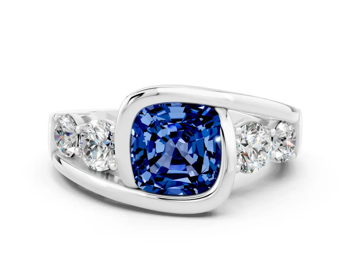 Bezel Set Cushion Cut Blue Sapphire Bypass Ring with Round Accents Silver