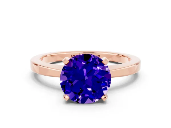Round Cut Tanzanite Solitaire Engagement Ring with Classic Band and Four-Prong Setting Rose gold