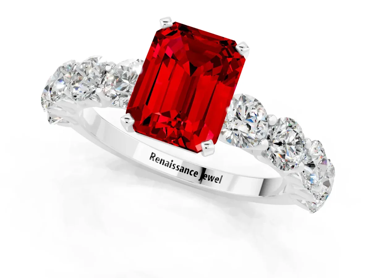 Emerald Cut Ruby Prong Setting with Side Stones on a Pave Band Platinum