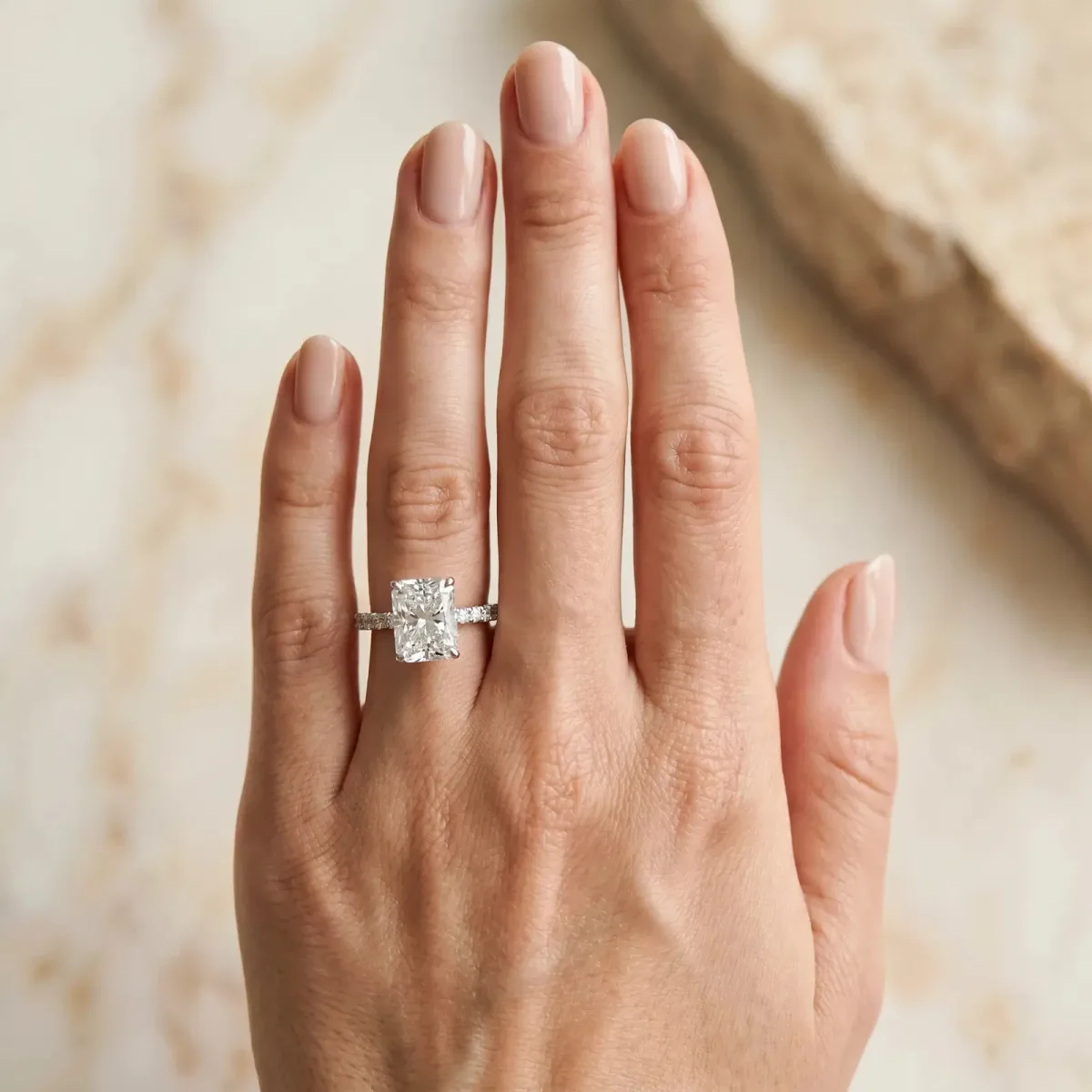 Radiant Cut Diamond Solitaire Ring with Round Pavé Band and Four-Prong Setting Silver