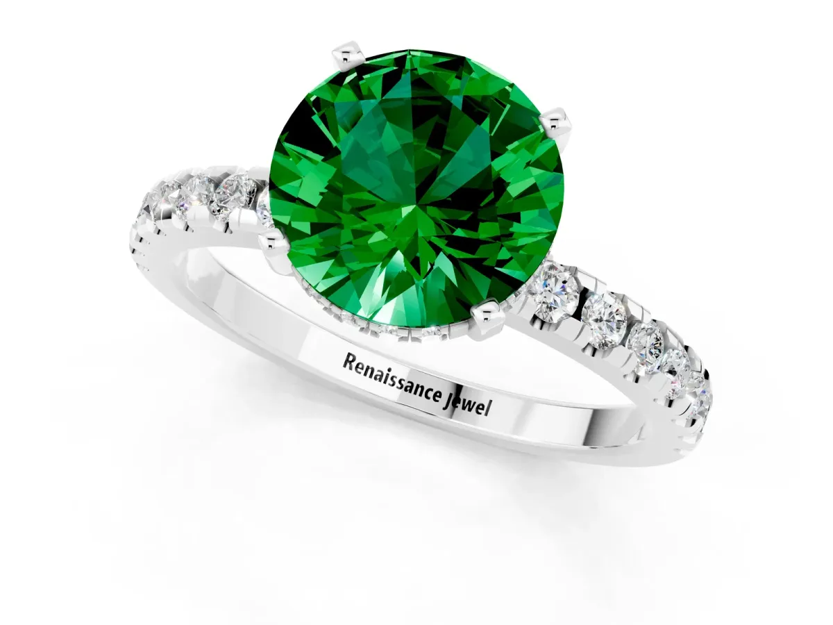 Round Cut Emerald Solitaire Ring with Round Pavé Band and Four-Prong Setting Silver