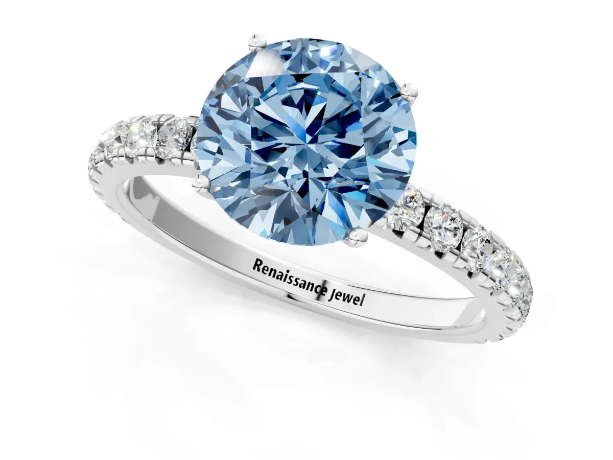 Fancy Blue Round Cut Diamond Pavé Solitaire Engagement Ring with Four-Prong Setting Silver
