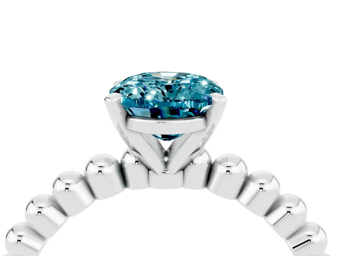 Oval Cut Blue Topaz Solitaire Ring with Beaded Band and Prong Setting Silver