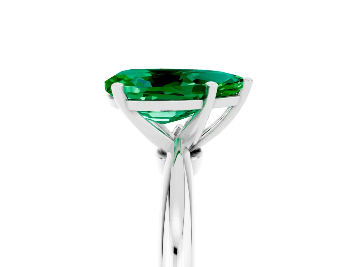 Pear Cut Emerald Solitaire Ring with Six-Prong Setting and Classic Band Silver