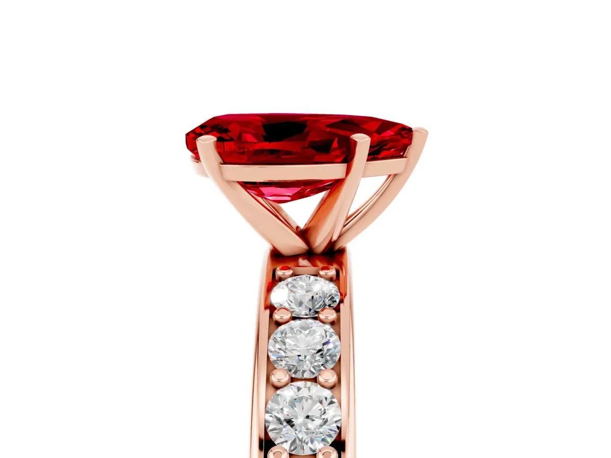 Pear Cut Ruby Engagement Ring with Channel Set Round Band and Prong Setting Rose gold