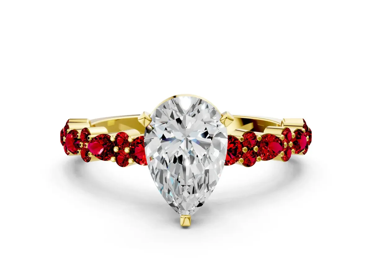 Pear Cut Diamond Side Stone Solitaire Ring with Round Ruby and Four-Prong Setting Yellow gold
