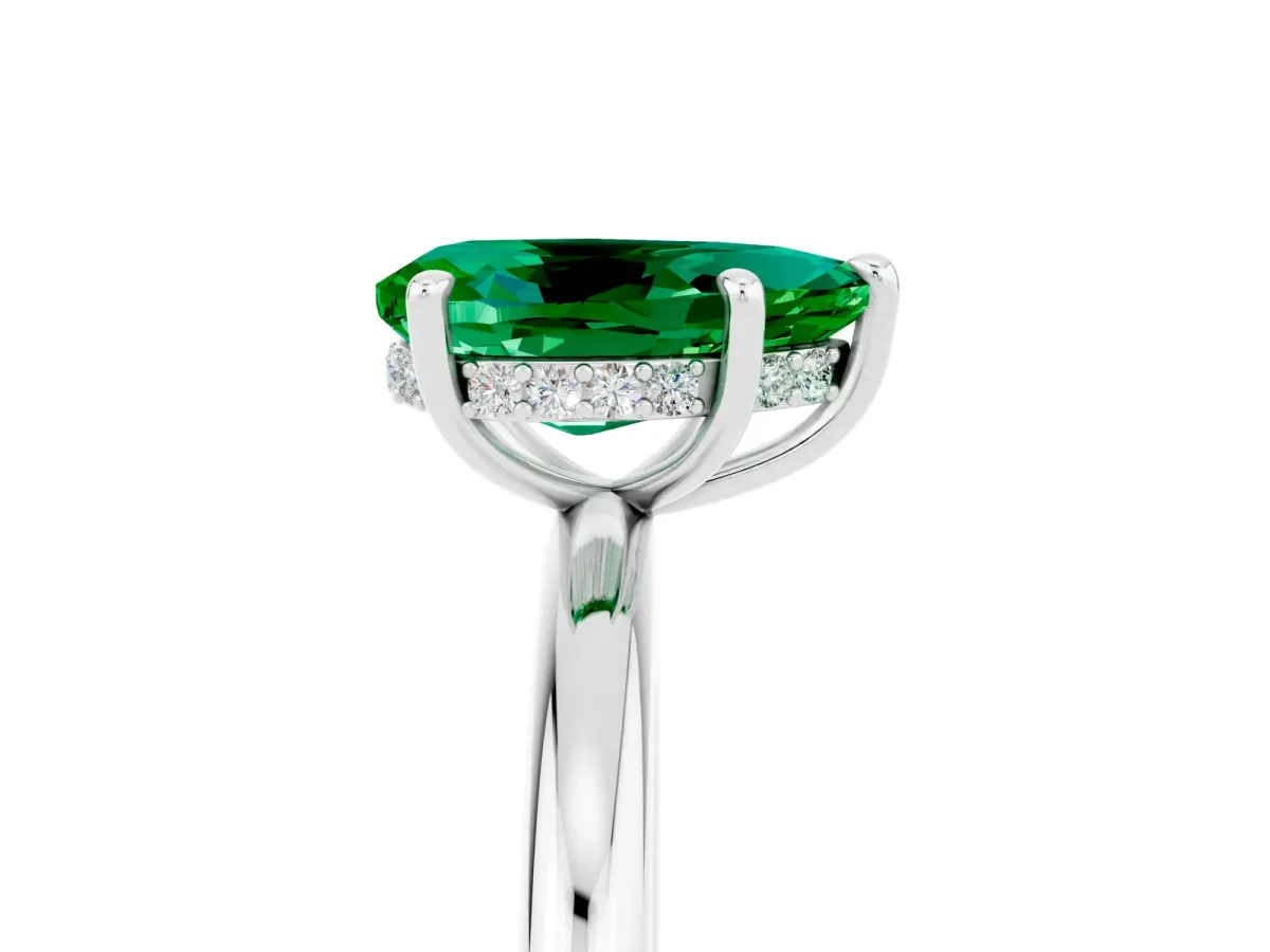 Pear Cut Emerald Solitaire Ring with Thin Band and Four-Prong Setting Silver