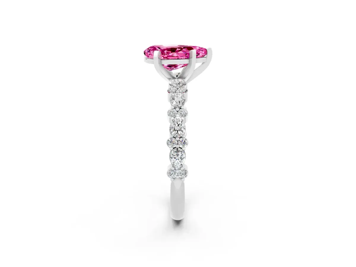 Pear Cut Pink Sapphire Side Stone Solitaire Ring with Round and Four-Prong Setting Silver