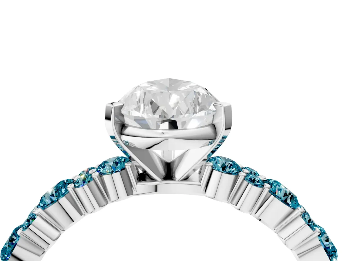 Pear Cut Diamond Side Stone Solitaire Ring with Round Blue Topaz and Four-Prong Setting Platinum