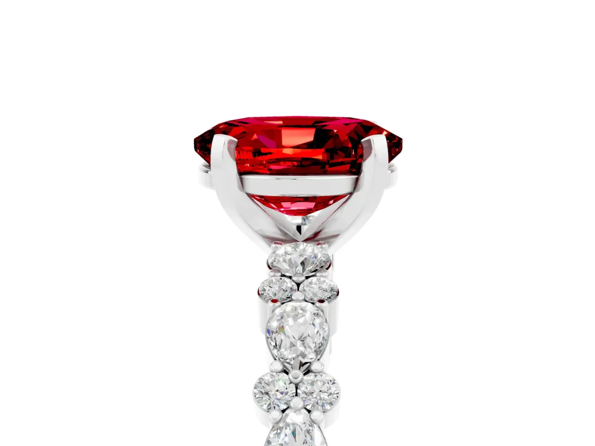 Oval Cut Ruby Side Stone Solitaire Ring with Round and Four-Prong Setting Platinum