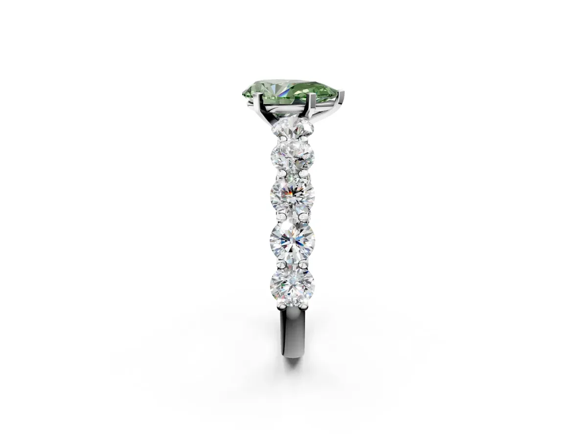 Fancy Green Pear Cut Diamond Prong Setting with Side Stones on a Pave Band Silver