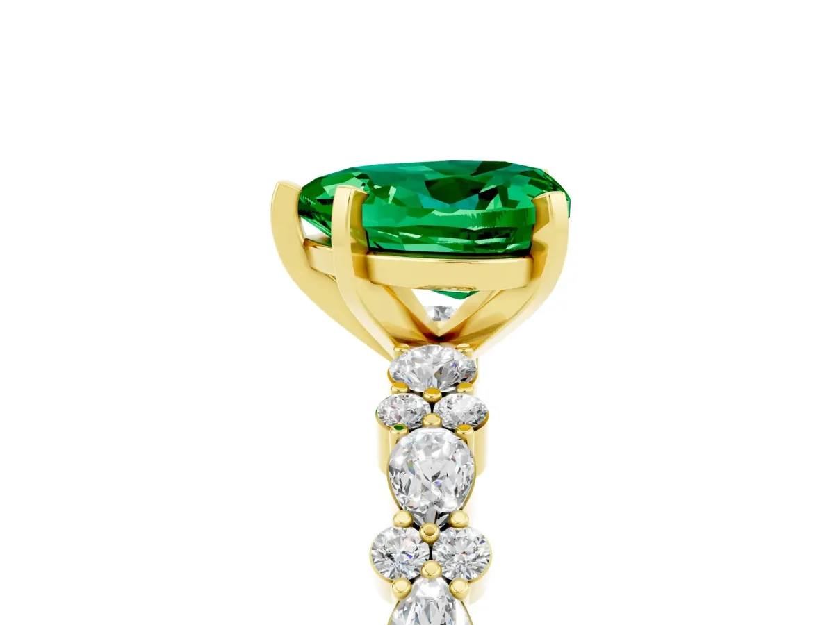 Heart Cut Emerald Side Stone Solitaire Ring with Round and Four-Prong Setting Yellow gold