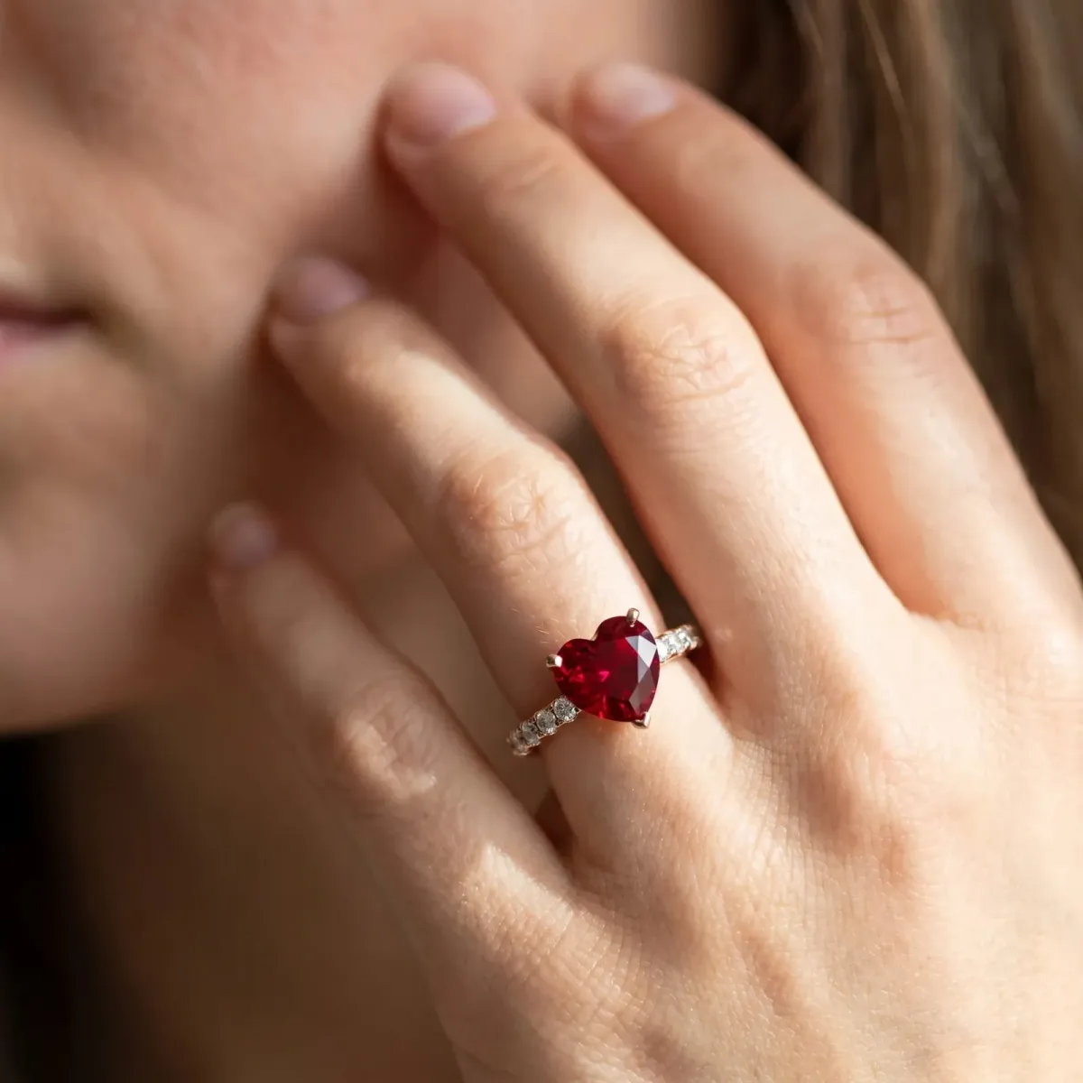 Heart Cut Ruby Solitaire Ring with Round Pavé Band and Four-Prong Setting Rose gold