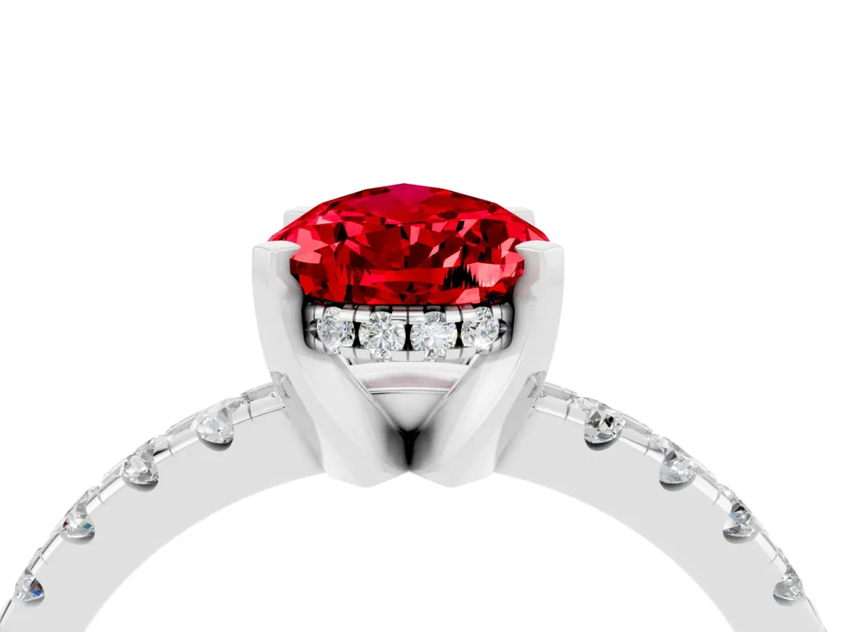 Pear Cut Ruby Solitaire Ring with Round Pavé Band and Four-Prong Setting Silver