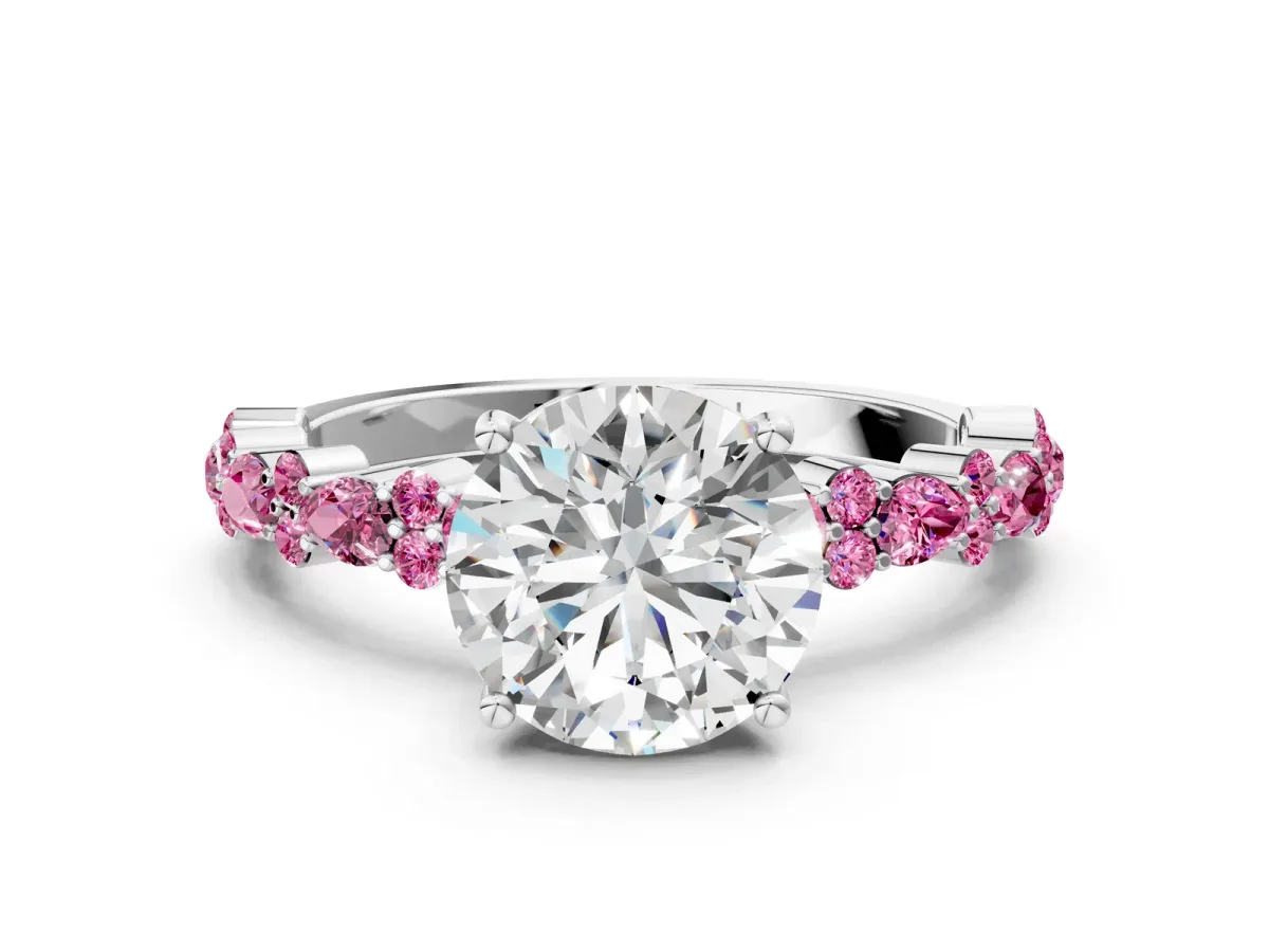 Round Cut Diamond Side Stone Solitaire Ring with Round Pink Sapphire and Four-Prong Setting Silver
