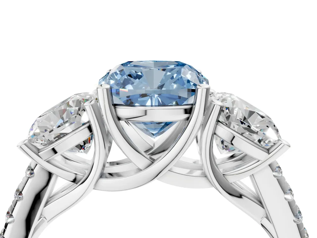 Fancy Blue Three-Stone Cushion Cut Diamond Ring with Round Pavé Band and Prong Setting Silver