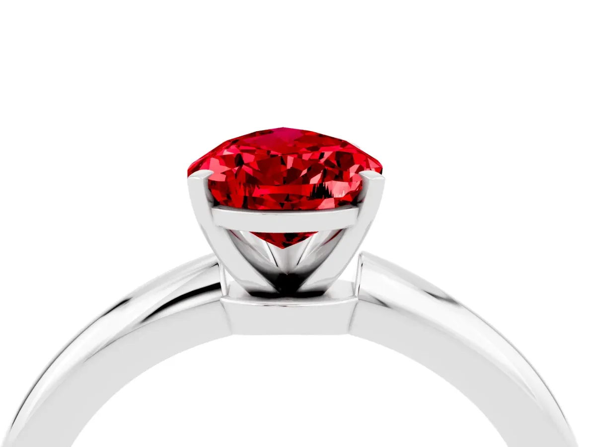 Pear Cut Ruby Solitaire Ring with Six-Prong Setting and Classic Band White gold
