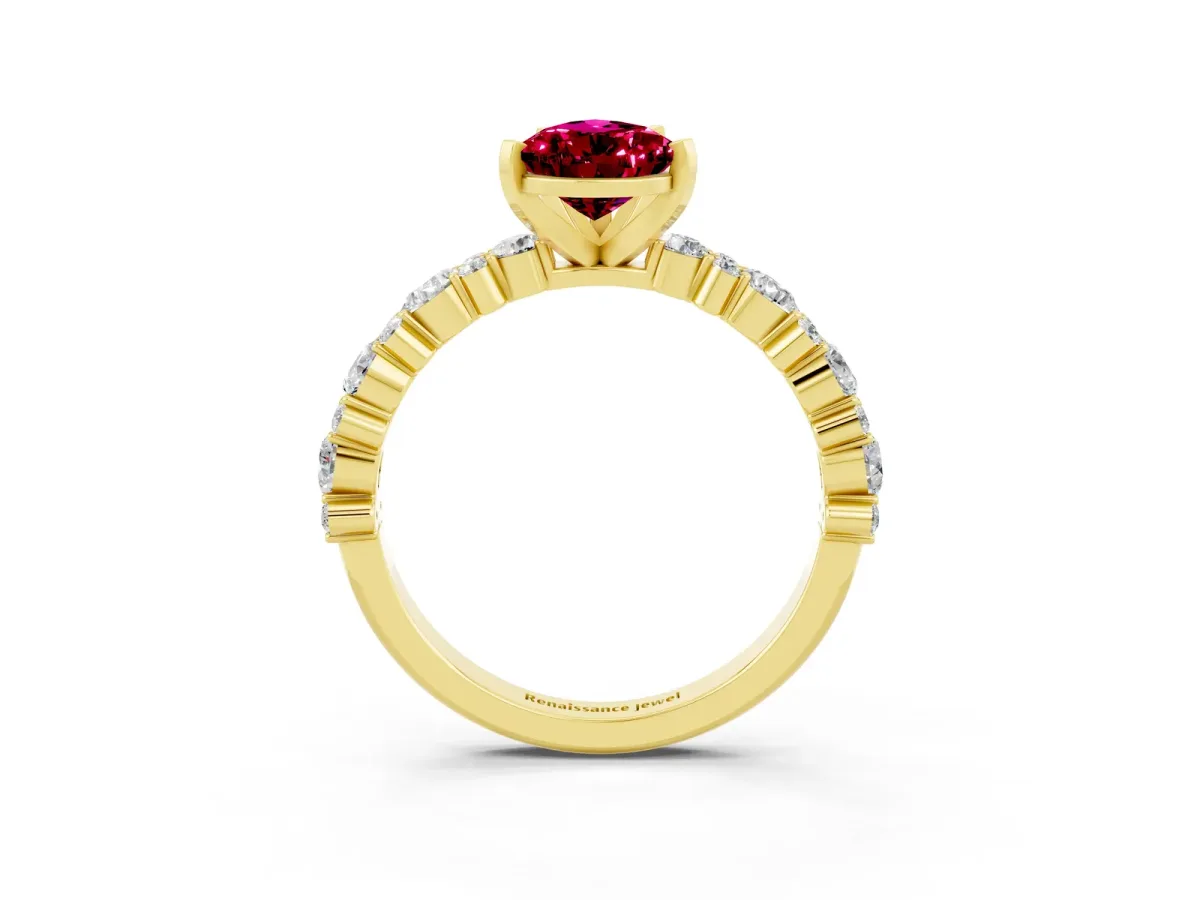 Pear Cut Garnet Side Stone Solitaire Ring with Round and Four-Prong Setting Yellow gold