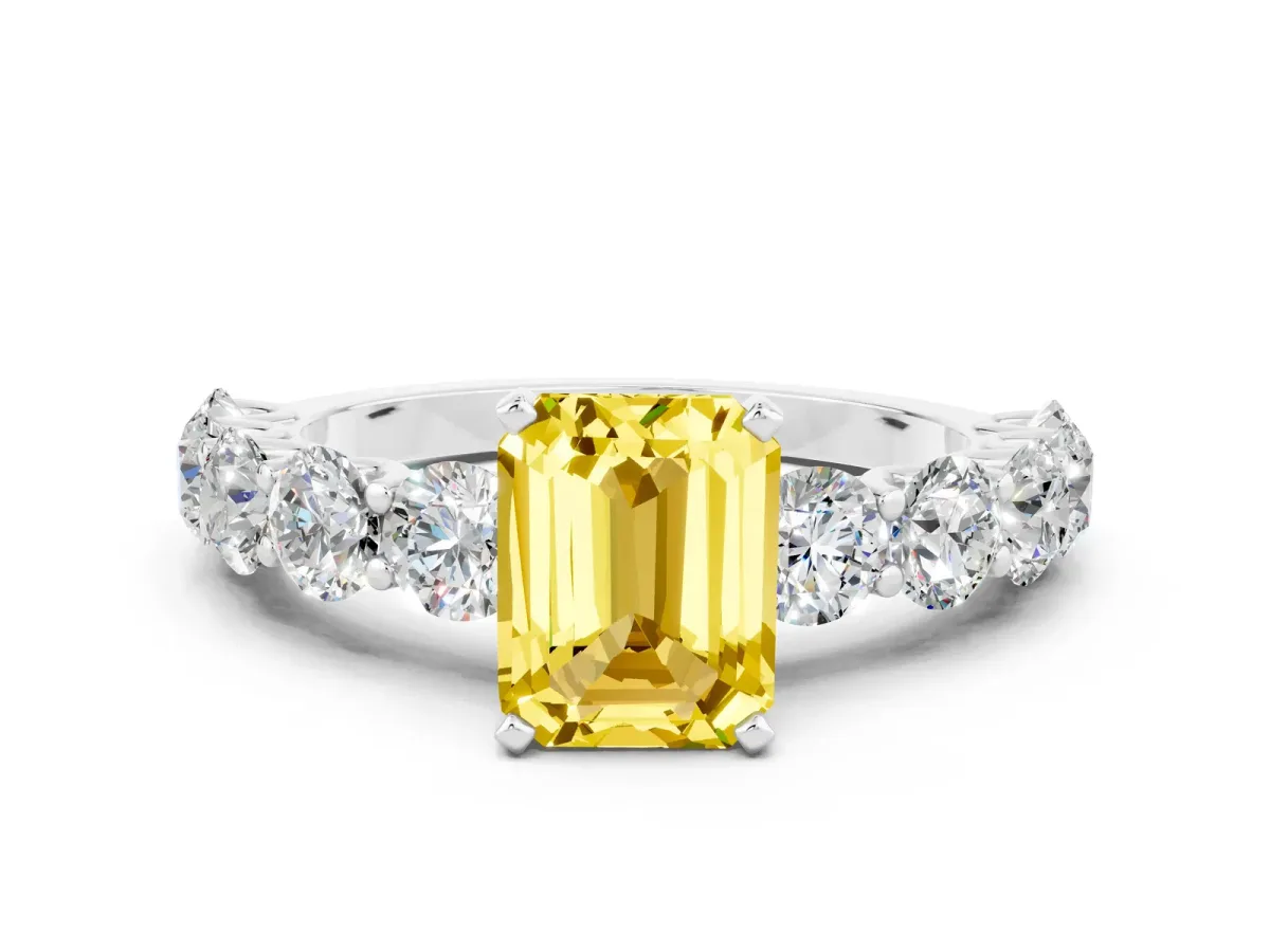 Emerald Cut Yellow Sapphire Prong Setting with Side Stones on a Pave Band Silver