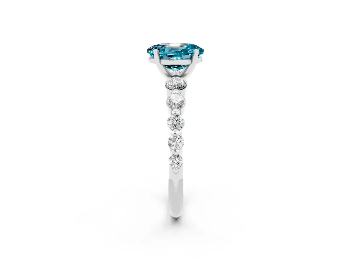 Oval Cut Solitaire Blue Topaz Ring with Pave Band and Four-Prong Setting Silver