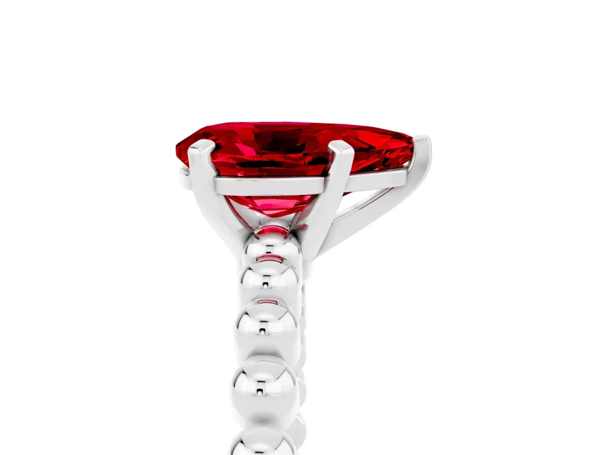 Pear Cut Ruby Solitaire Ring with Beaded Band and Prong Setting Silver