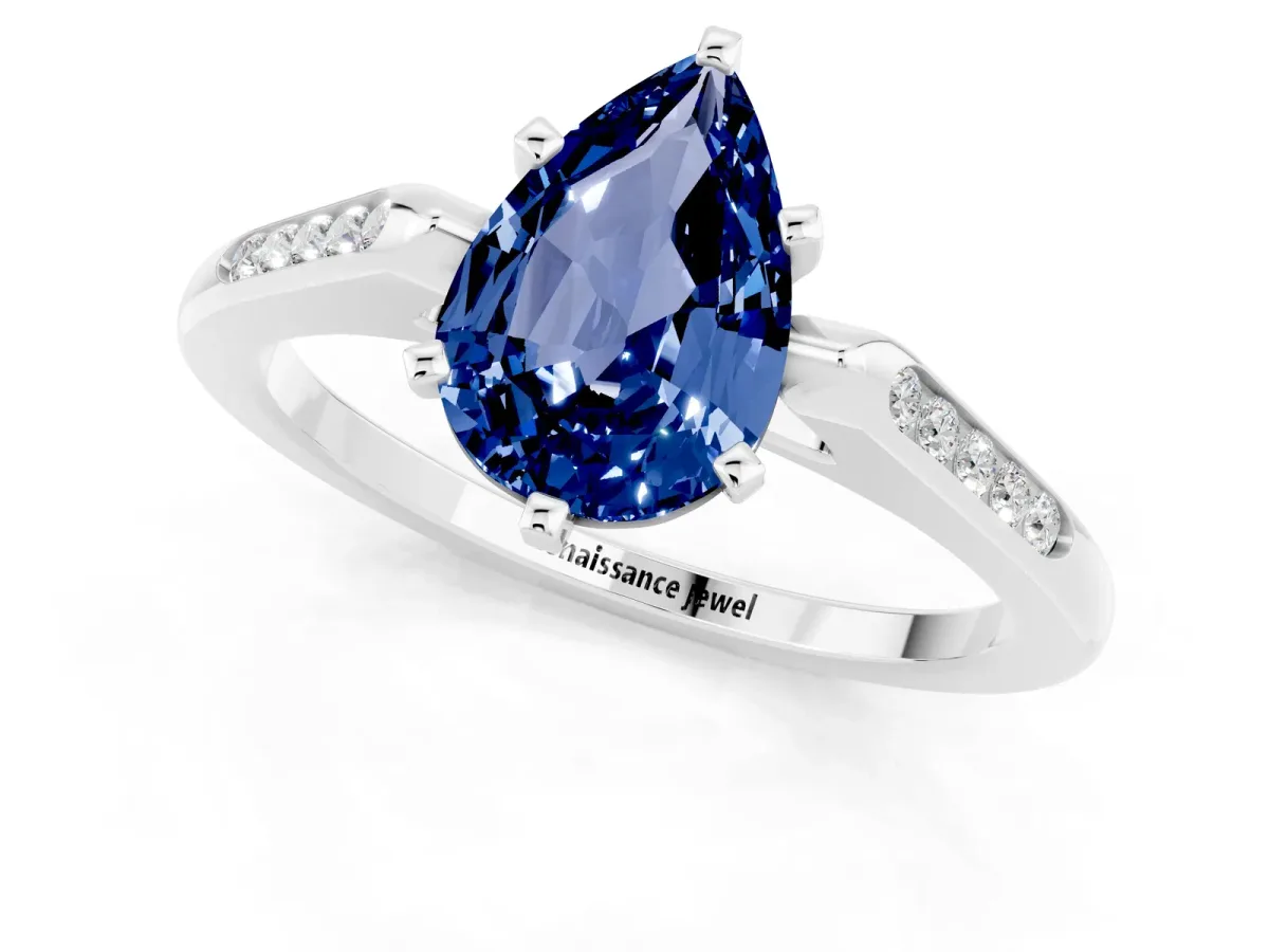 Pear Cut Blue Sapphire Solitaire Ring with Channel Set Round Band and Prong Setting Silver