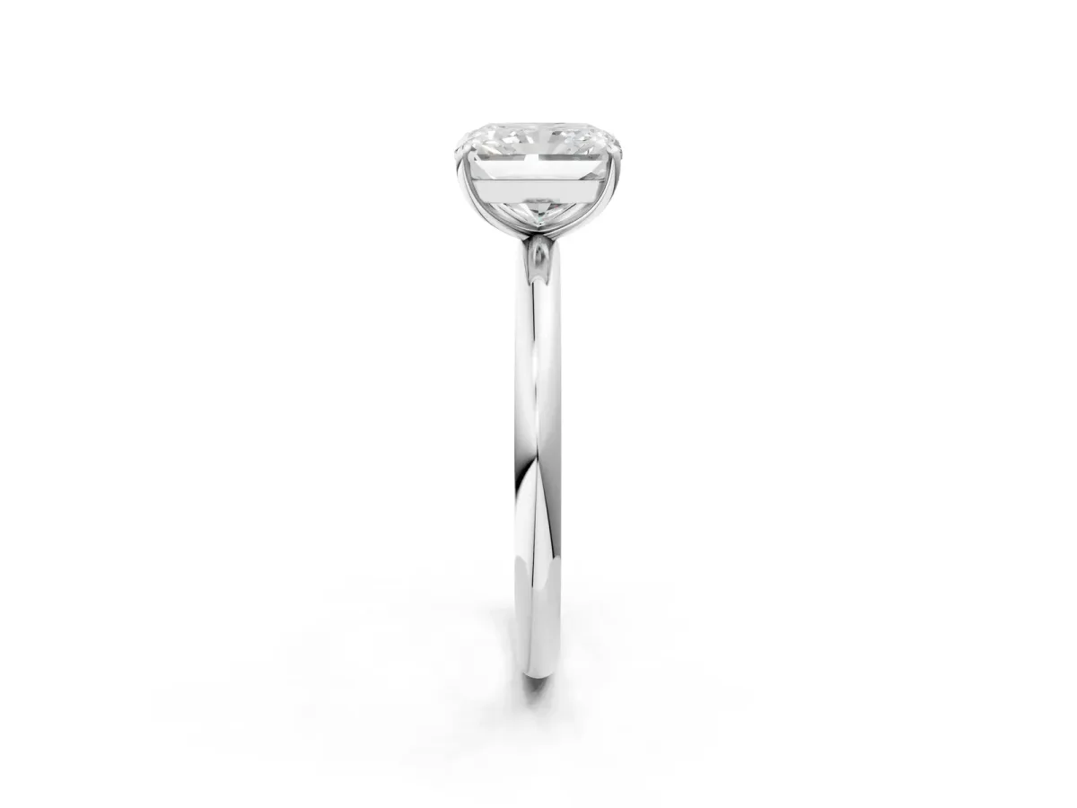 Radiant Cut Solitaire Diamond Ring with Four-Prong Setting on a Plain Band Platinum