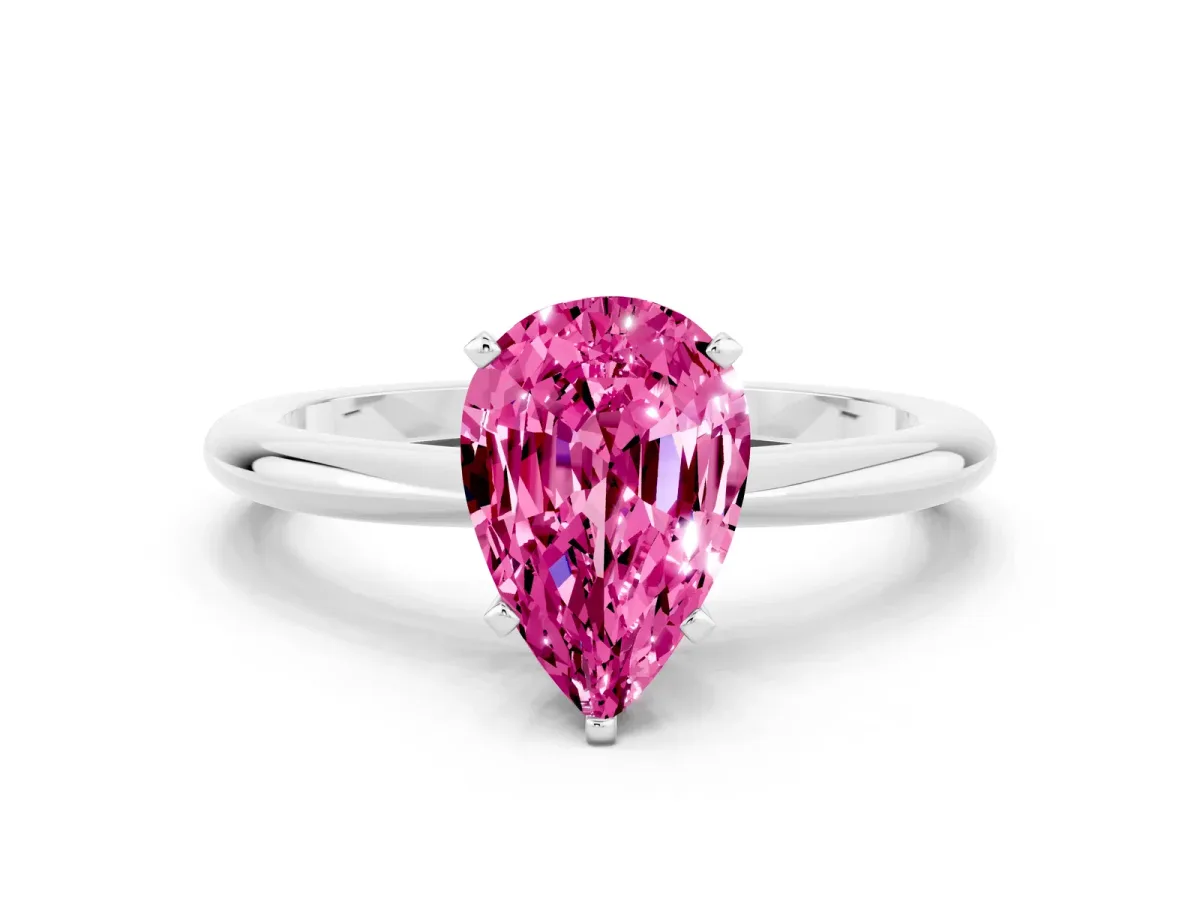 Pear Cut Pink Sapphire Solitaire Ring with Six-Prong Setting and Classic Band Silver