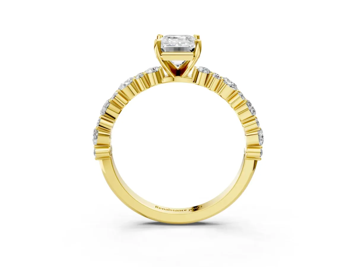 Emerald Cut Diamond Side Stone Solitaire Ring with Round and Four-Prong Setting Yellow gold