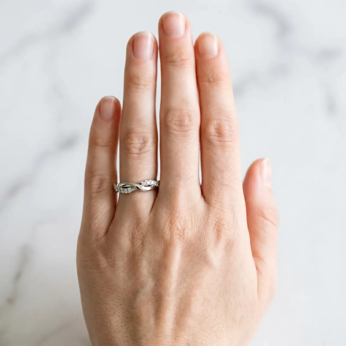 Round Diamond Twisted Infinity Band with Prong Setting Silver
