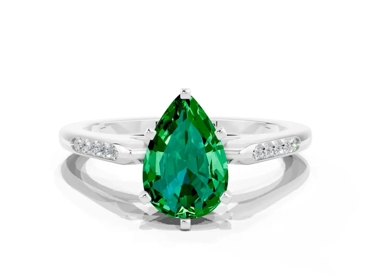 Pear Cut Emerald Solitaire Ring with Channel Set Round Band and Prong Setting Silver