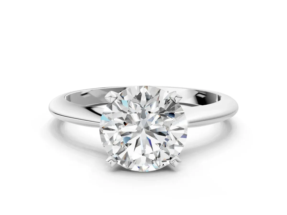 Round Cut Diamond Solitaire Engagement Ring with Classic Band and Four-Prong Setting Silver