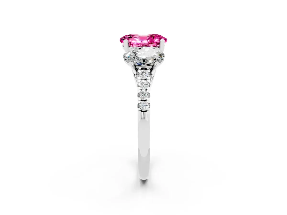 Three-Stone Oval Cut Pink Sapphire Ring with Round Pavé Band and Prong Setting Silver