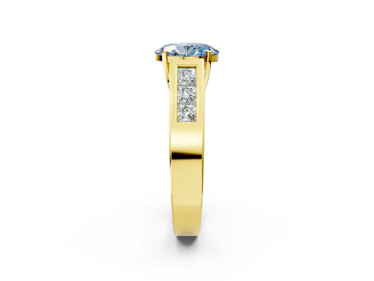 Fancy Blue Oval Cut Cut Channel Set Solitaire Ring with Four-Prong Setting Yellow gold