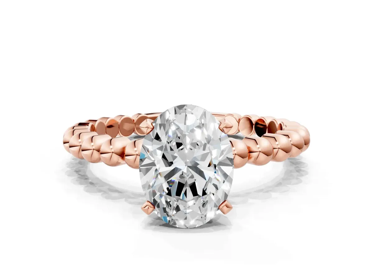Oval Cut Diamond Solitaire Ring with Beaded Band and Prong Setting Rose gold