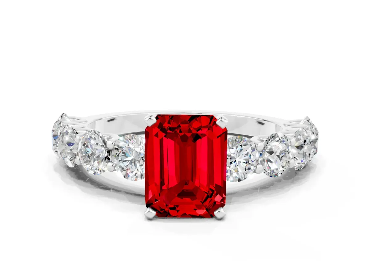 Emerald Cut Ruby Prong Setting with Side Stones on a Pave Band Platinum