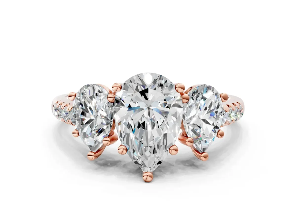 Three-Stone Pear Cut Diamond Ring with Round Pavé Band and Prong Setting Rose gold