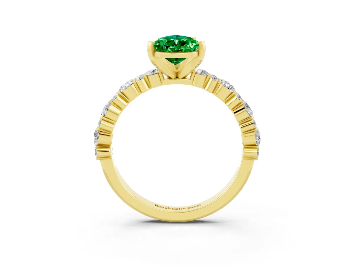 Pear Cut Emerald Side Stone Solitaire Ring with Round and Four-Prong Setting Yellow gold