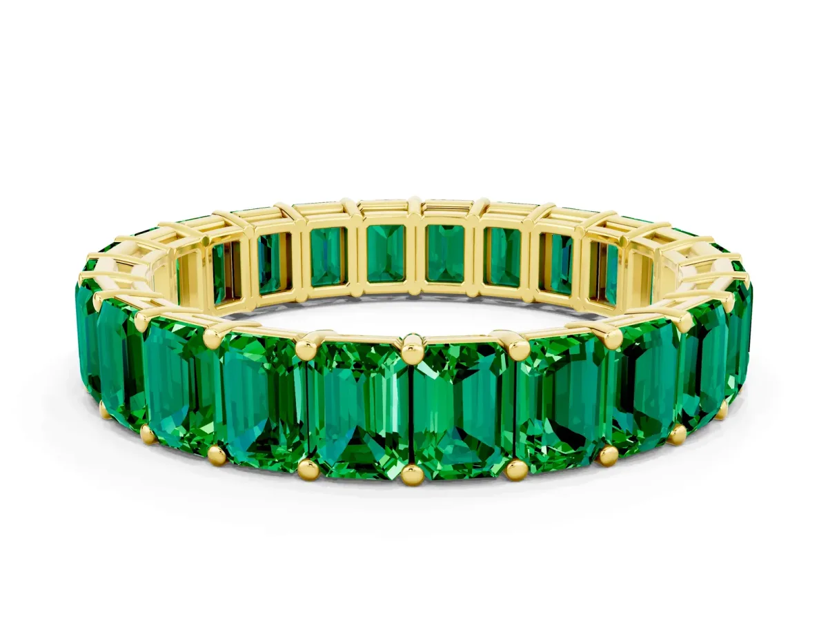 Emerald Cut Emerald Eternity Band with Shared Prong Setting Yellow gold