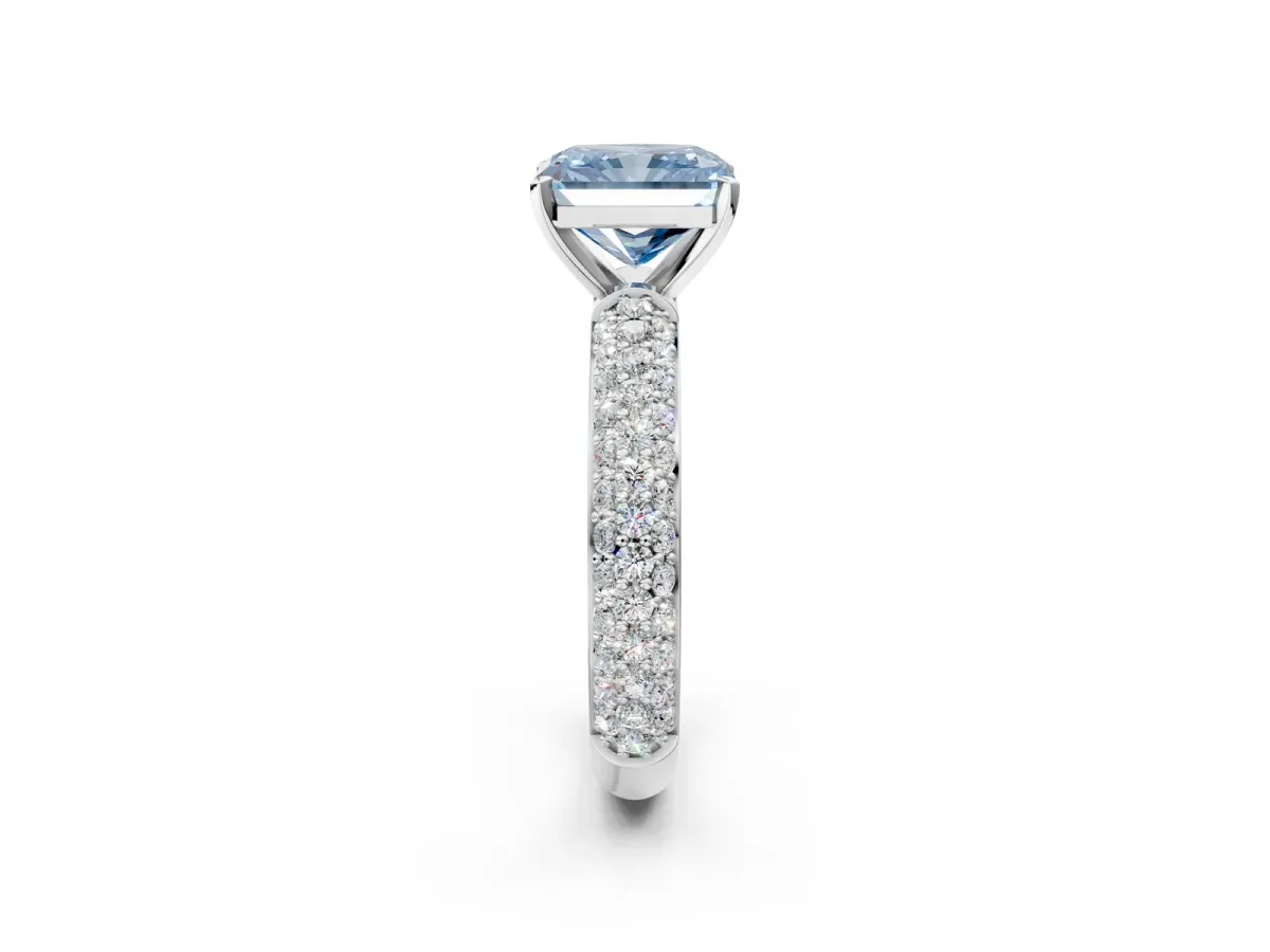 Fancy Blue Radiant Cut Diamond Solitaire Ring with Prong Setting and Pavé Band Platinum