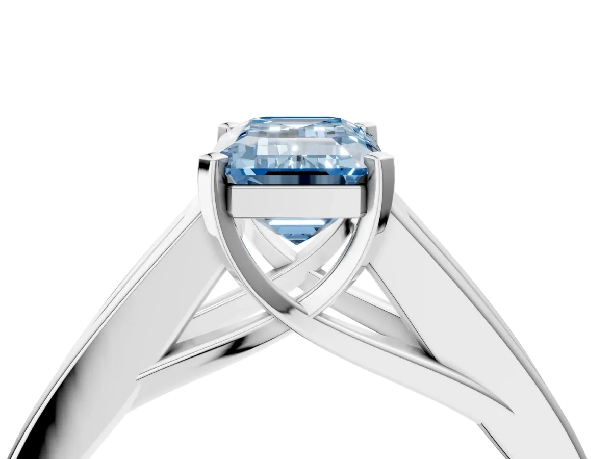 Fancy Blue Emerald Cut Cut Channel Set Solitaire Ring with Four-Prong Setting Platinum