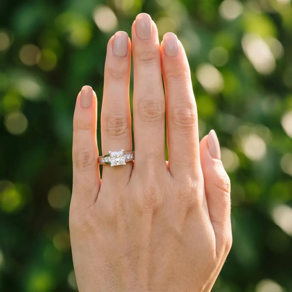 Cushion Cut Cut Channel Set Solitaire Ring with Four-Prong Setting Platinum