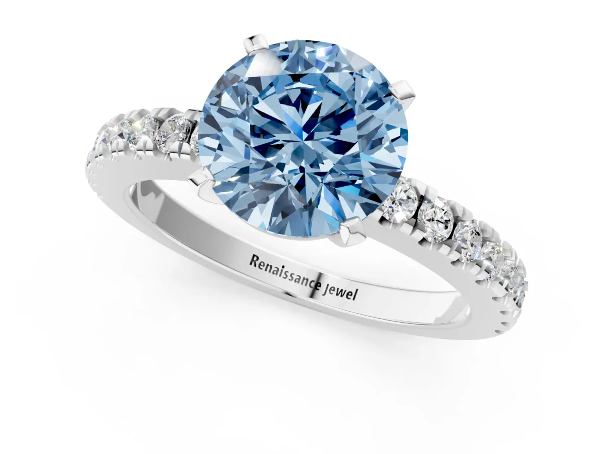 Fancy Blue Round Cut Solitaire Diamond with Pavé Band and Four-Prong Setting Silver