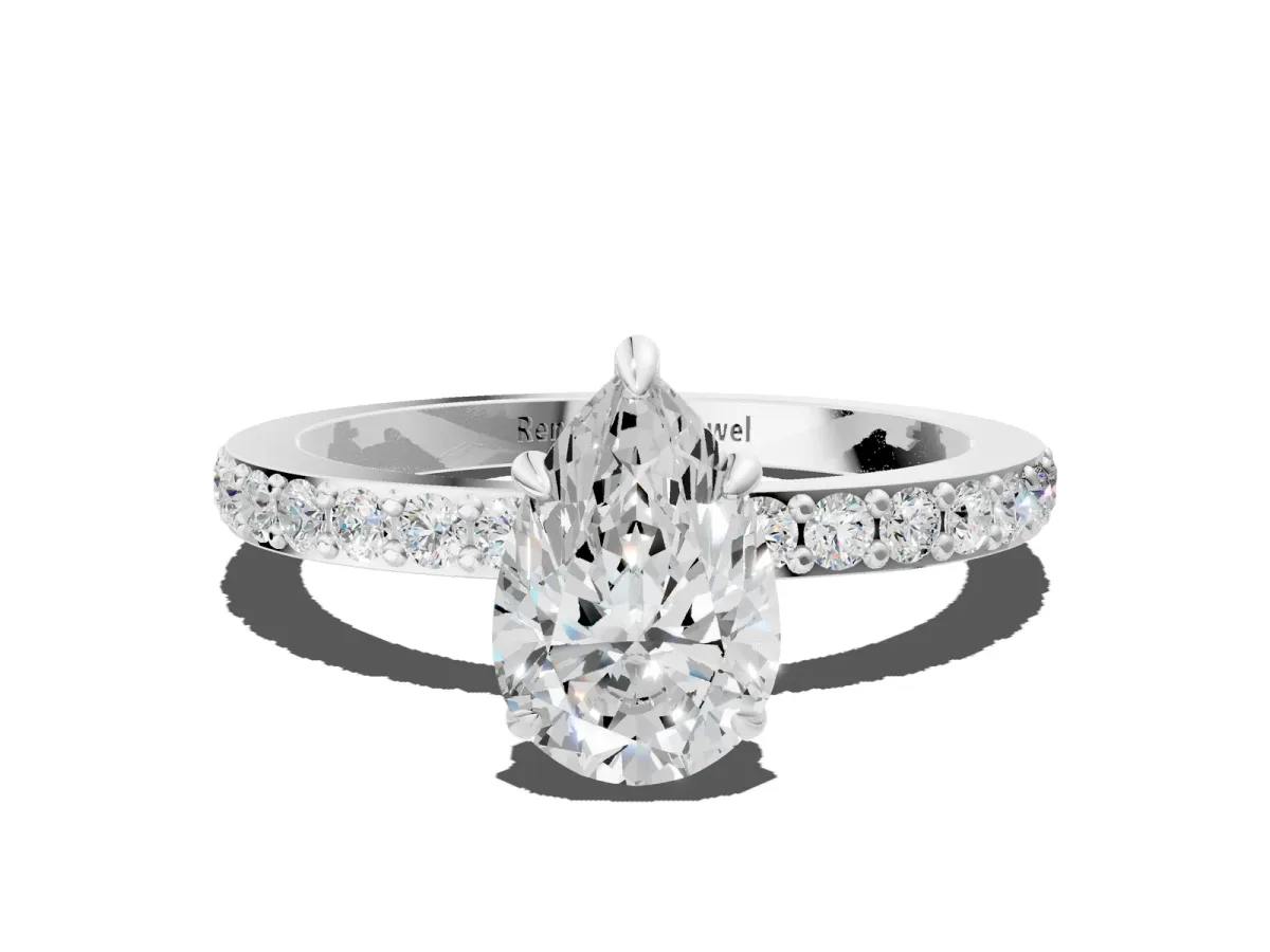 Pear Cut Diamond Solitaire Engagement Ring with Pavé Band and Four-Prong Setting Silver