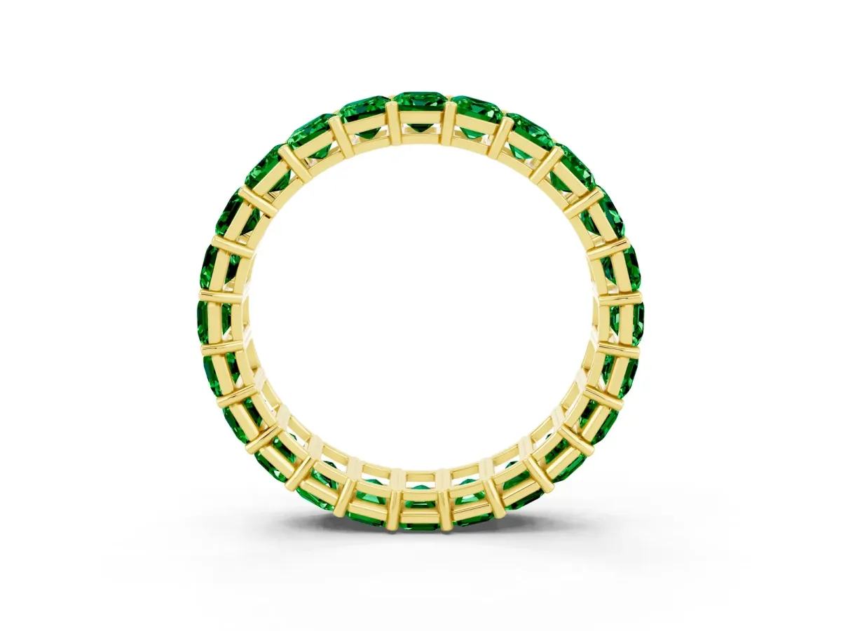 Emerald Cut Emerald Eternity Band with Shared Prong Setting Yellow gold