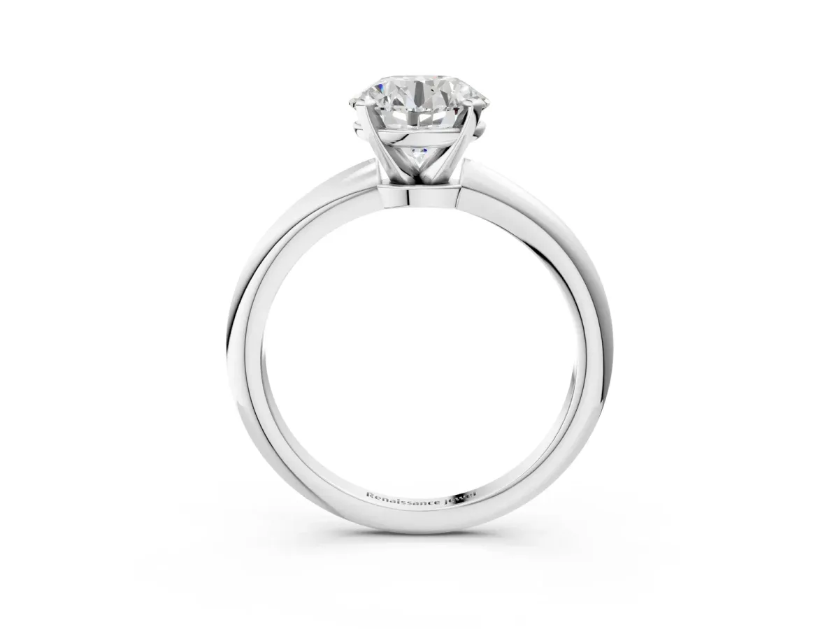 Round Cut Diamond Solitaire Ring with Six-Prong Setting and Classic Band Silver